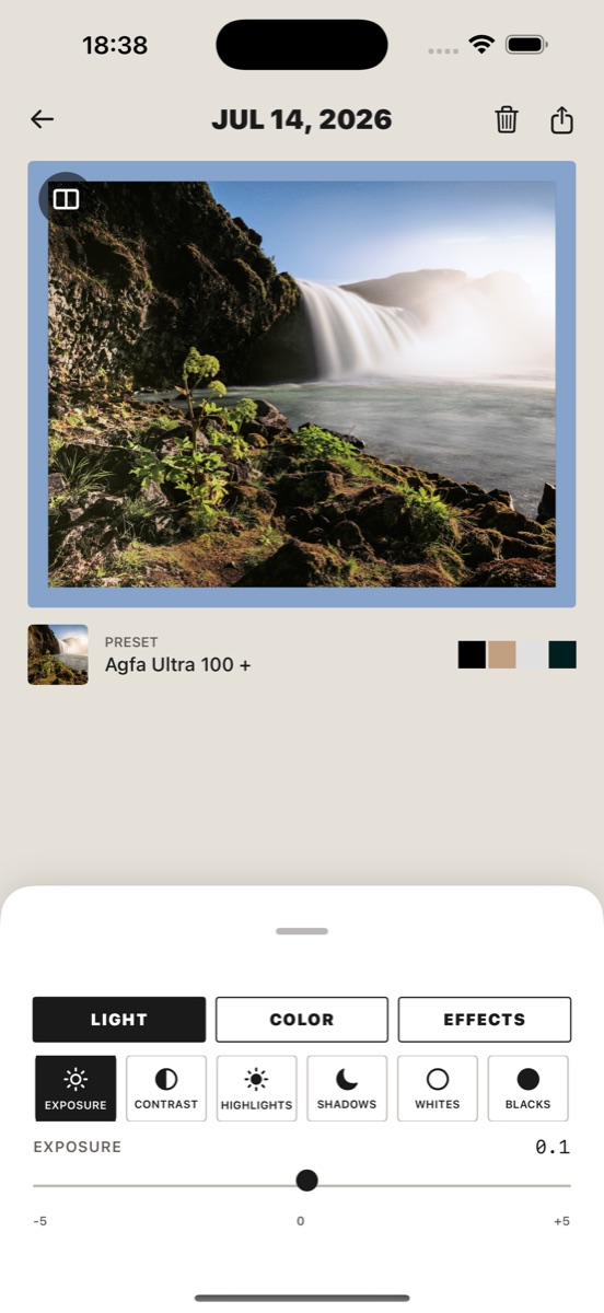 Simul darkroom editor showing a developed waterfall photograph and adjustment controls
